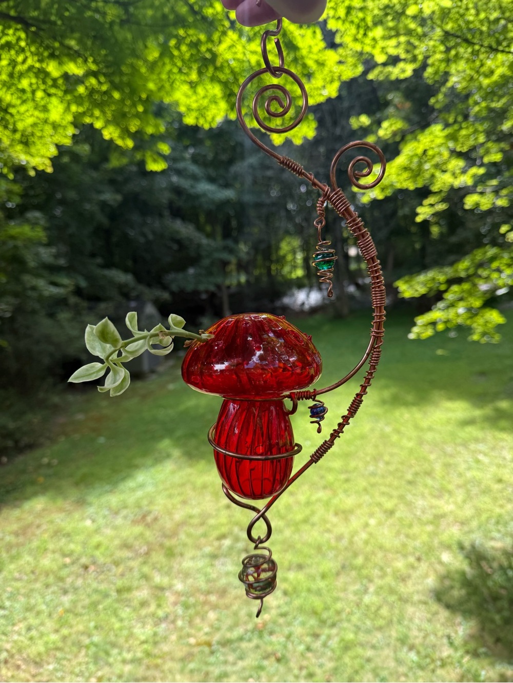 Handmade mushroom hanging propagation vase.